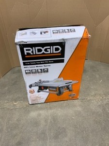 lot 16 image: RIGID 6.5 AMP CORDED 7 IN. TABLE TOP WET TILE SAW. SEE PICTURES