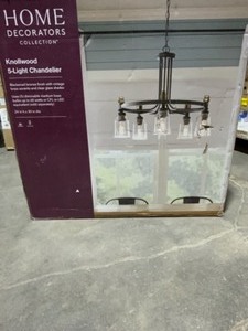 lot 59 image: HOME DECORATORS COLLECTION KNOLLWOOD 5-LIGHT BLACKENED BRONZE CHANDELIER WITTH VINTAGE BRASS ACCENTS AND CLEAR GLASS SHADES. SEE PICTURES