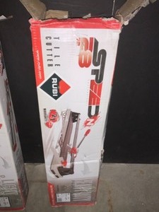 ASSORTED RUBI TILE CUTTERS. VARIOUS SIZES AND CONDITIONS. SEE PICTURES