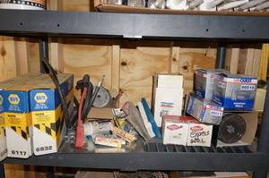 lot 37 image: Contents of Shelf - Automotive Filters, Parts, Battery Cables