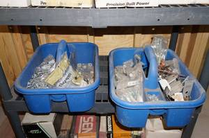 lot 39 image: Contents of Shelf - Chain, Lag Screws, Tile Spacers,