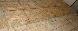 lot 28 image: Section of OSB Plywood - 58 Thick - 2 x 8