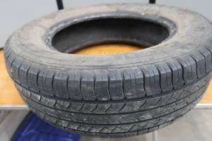 lot 114 image: TIRE AND CHAIN