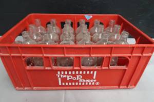 lot 121 image: POP SHOPPE BOTTLES