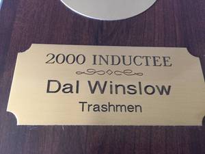 lot 30 image: Dal Winslow of The Trashmen 2000 Rock and Roll Hall of Fame Plaque