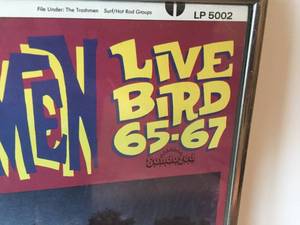 lot 79 image: The Trashmen Live Bird 65 To 67 Framed Album Cover
