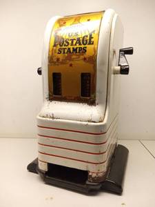 lot 18 image: Very Rare Vintage 1960s Enameled Cast Metal Stamp O Matic US Postage Stamp Machine NEEDS REPAIR
