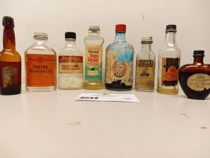 lot 60 image: Vintage Medicine Bottles
