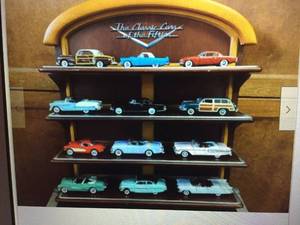 lot 1 image: FRANKLIN MINT - Classic Cars of the 50s 12 Cars, Display Shelf & Book - GREAT COLLECTION - NICE - IN BOX - SEE PICTURES