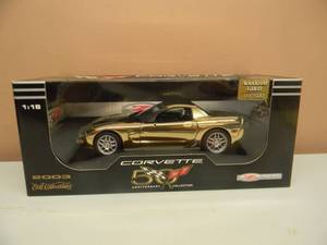 lot 9 image: ERTL 118 SCALE 2003 CORVETTE Z06 ANODIZED GOLD - 1 OF 500 - Sequential # License Plate - NEW IN BOX - AWESOME PIECE - SEE PICTURES