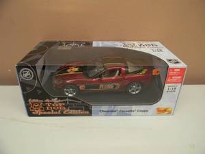 lot 16 image: Top Dog Limited Edition NHL Calgary Flames 118 Scale Chevrolet Corvette Coupe - NEW IN BOX - SEE PICTURES