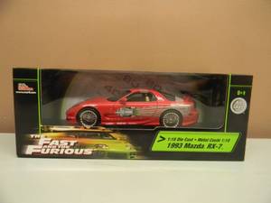 lot 34 image: ERTL RACING CHAMPIONS THE FAST AND THE FURIOUS 118 SCALE DIE CAST 1993 MAZDA RX-7 - NEW IN BOX - GREAT PIECE - RARE - SEE PICTURES