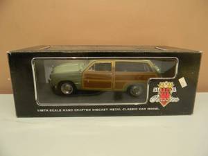 lot 35 image: MOTOR CITY CLASSICS 118 SCALE DIE CAST - 1949 FORD WOODT WAGON - NEW IN BOX - SEE PICTURES