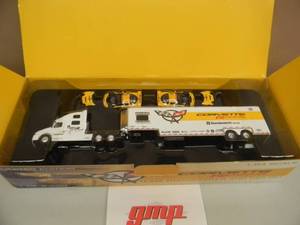 lot 37 image: GMP CORVETTE RACING TEAM TRANSPORTER AND CAR SET - 164 SCALE - NEW IN BOX - AWESOME PIECE - SEE PICTURES