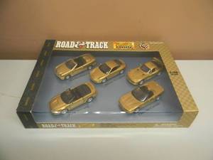 lot 41 image: ROAD & TRACK MILLENNIUM EDITION 2000 MOTORIZED 138 SCALE 5 CAR SET - NEW IN BOX - SEE PICTURES