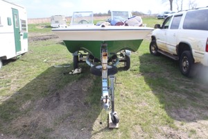 lot 97 image: 1974 Starcraft Boat  Motor  Trailer Package