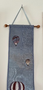 lot 135 image: Wall Tapestry by Nicky Boehme- Hot Air Balloon Themed