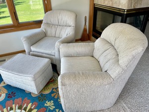 lot 165 image: Two Upholstered Chairs and an Ottoman
