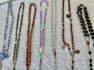 lot 310 image: Rosary Grouping