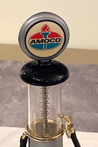 lot 222 image: Amoco Collectible Gas Pump and Two Small Die Cast Cars