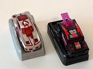 lot 233 image: Two Vintage Motorized Hot Wheels