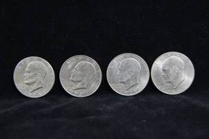lot 28 image: 4 Eisenhower Dollar Coins