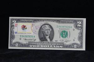 lot 38 image: Illinois Stamped 1976 First Day of Issue $2 Bill