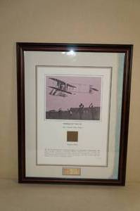 lot 67 image: Framed Original Fabric from Flight Suit of First Transcontinental Flight
