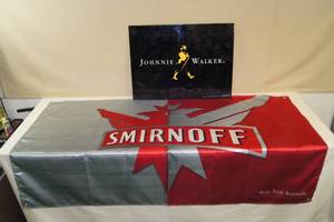 lot 60 image: Johnnie Walker Tin Sign and Smirnoff Flag