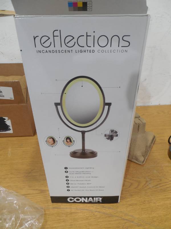 lot 51 image: Conair Oval Double Sided Lighted Mirror