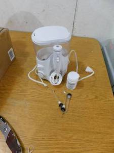 lot 47 image: Waterpik Ultra Water Flosser - White