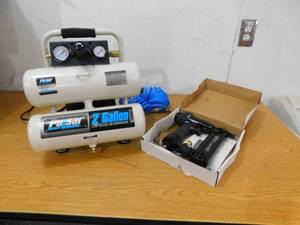 lot 63 image: Pulsar 2-Gallon Air Compressor with Brad NailerStapler