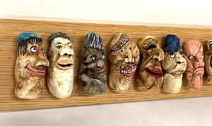 lot 40 image: Unique and Fun Molded Face Sculpture by Modernist Dick Seeger