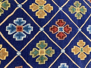 lot 56 image: Incredible Khamsum Carpet