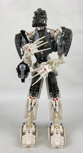 lot 85 image: Four Vintage Lego Bionicle Figures including (8989) Glatorian Mata Qui, and (8699) Takanuva from 2005-2007