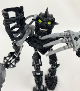 lot 101 image: Three Vintage Lego Bionicle  Figures Including (8913) Toa Mahri Toa Nuparu and (8729) Inika Toa Nuparu