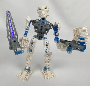lot 106 image: Three Vintage Lego Bionicles Including (8732) Irika Toa Matoro w Lighted Spear and (8905 ) Piraka Thok