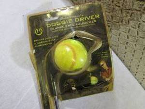 lot 95 image: (E-2) Doggie Driver Tennis Ball Lau...