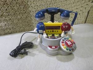 lot 159 image: (FS) M&M Phone Alarm Clock AMFM Ra...
