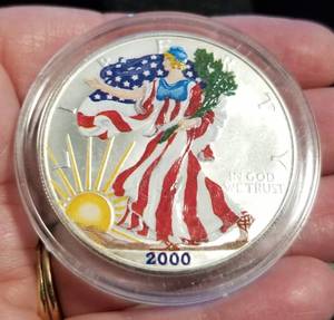 lot 07 image: 2000 COLORIZED AMERICAN SILVER EAGLE 1 TROY OZ. .999 FINE SILVER IN AIRTITE