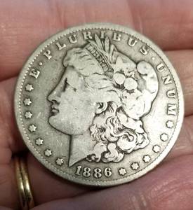 lot 21 image: 1886-O MORGAN SILVER DOLLAR