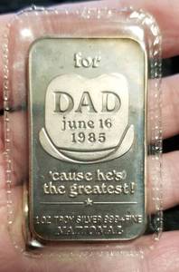 lot 50 image: 1 TROY OZ. .999 FINE SILVER BAR DAD THE GREATEST ART BAR SEALED