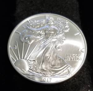 lot 57 image: 2017 AMERICAN SILVER EAGLE 1 TROY OZ. .999 FINE SILVER DOLLAR