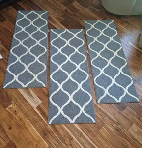 lot 91 image: (3) Matching Lattice Runner Rugs