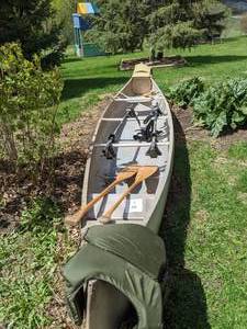 lot 1 image: 17 Ft. Grumman Aluminum Canoe with Paddles and Life Jacket