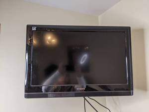 lot 255 image: Insignia Wall Mount TV with Built-In DVD Player