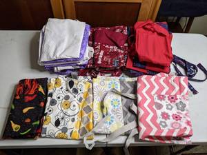 lot 213 image: Lot of Reversible Aprons