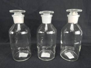 lot 106 image: Set of 3 Vintage 250 ML Narrow Mouth Glass Bottles With Stoppers
