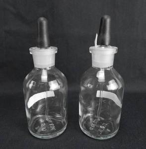 lot 115 image: Set of 2 Vintage 250 ML Narrow Mouth Glass Bottles With Stoppers