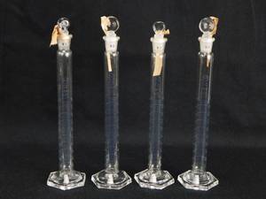 lot 127 image: Set of 4 Mercer Glass Works Merco 10 ML Graduated Mixing Cylinders With Stoppers